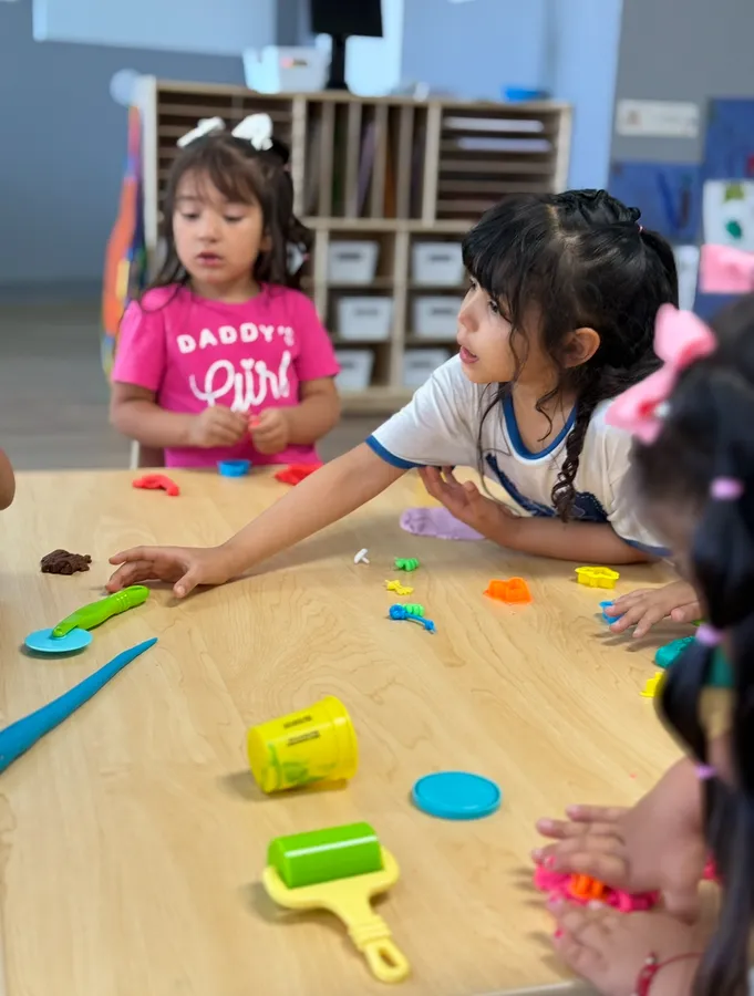 Children doing arts and crafts at First Chapter Academy